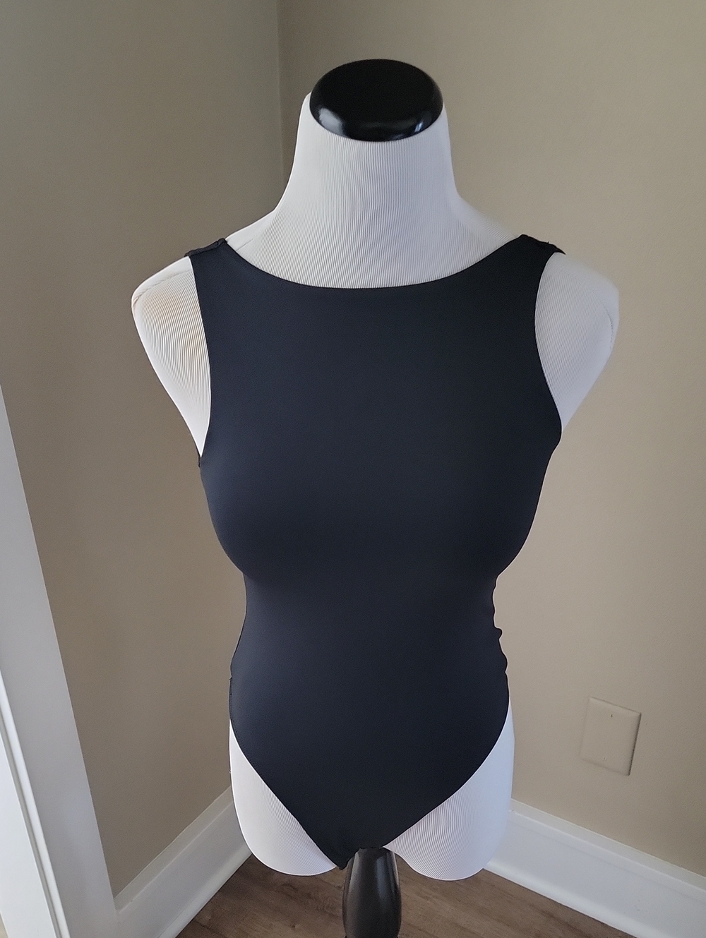 NWOT XS Black Sleeveless One-Piece Bodysuit